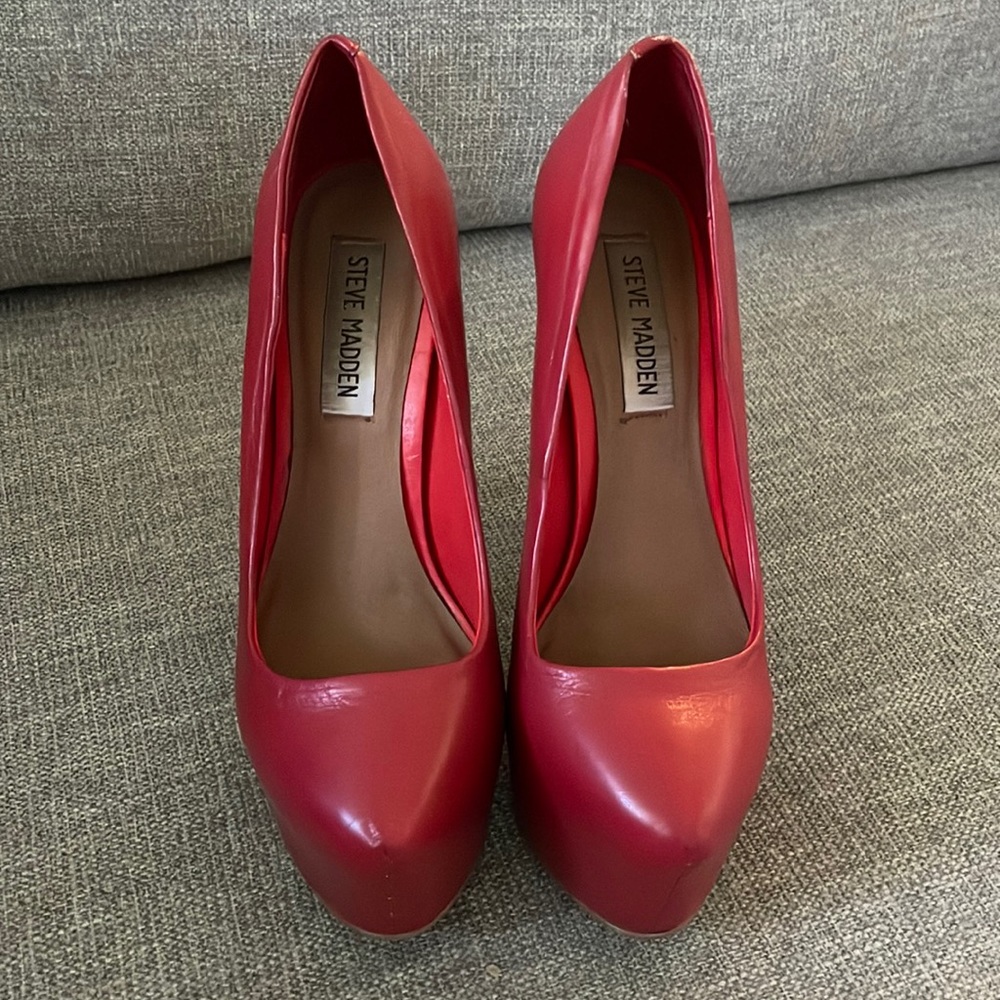 Steve Madden. About 4 1/2 - 5 inch heel.